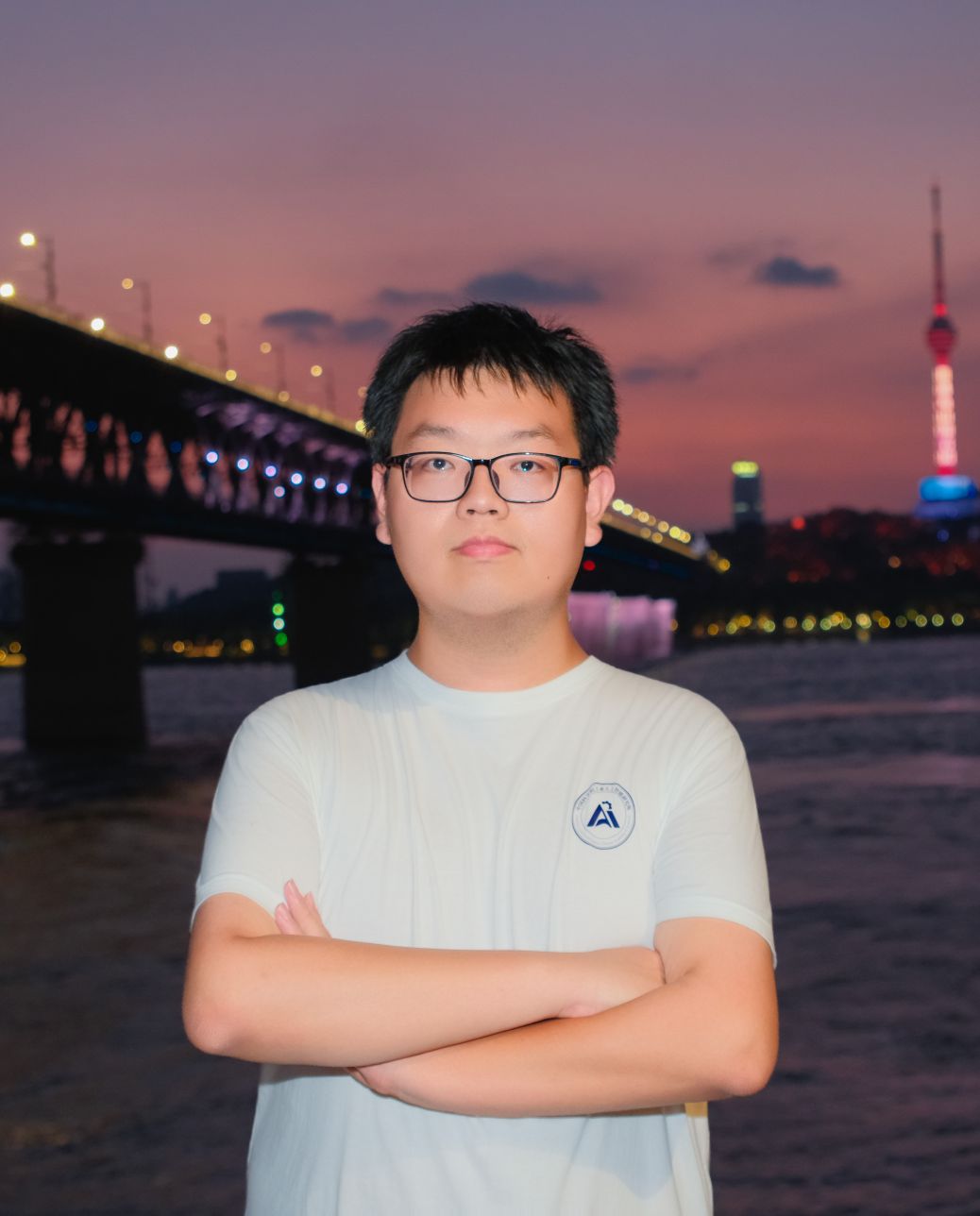 Yifei Zhang at dusk by the waterfront